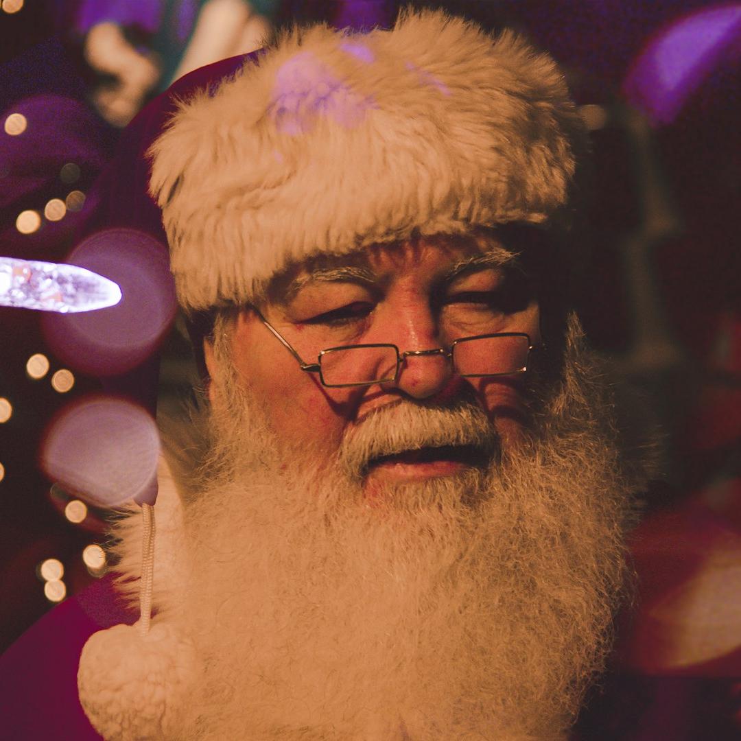 bokeh photography of Santa Claus